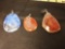 (3) Awesome Smooth Stone pendants, pinks and Blues. One pendant rough around the edges