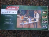 Coleman 4 in 1 outdoor table, Appears New Condition