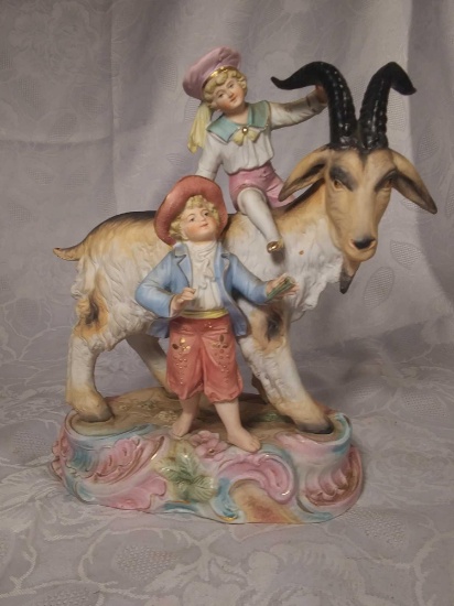 Precious Porcelain Statue of Boy and Girl on Goat, Marked "10 Hi"