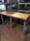 Large modern work table with steel legs and wooden top
