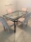 Stunning clear glass top and Steel dining table with chairs