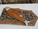 Paisley pattern table runner and wooden fish cheese serving tray