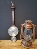 Kerosene Lantern and Vintage Barometer