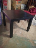 Little black IKEA style pressed wood table