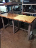 Large modern work table with steel legs and wooden top