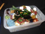 Small Container with Shimmering Holiday Decor Including Old Ornaments