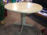 Light wood double drop side kitchen table