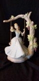 Lovely swinging Lady-ceramic with repairs