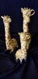 Adorable giraffe family with scissor glasses