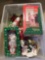 fun holiday grouping including boxed figures from Nick's cook, Santa's Workshop, tree skirts and