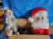 Holiday Lighting and decor including moose plush and door Santa
