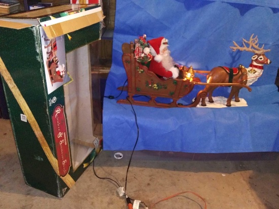 large animated Reindeer and Santa on sleigh, illuminated, animated, and Musical!