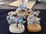 pretty grouping of vintage carousels on bases including Lefton and Summit