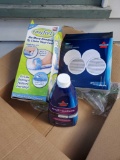 New in package BISSEL Mop pads and cleaner, and Easy Feet