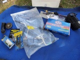 various Garage useful items including NIP, Sport Club, Mustang part, Mercedes tune up Guide, jump