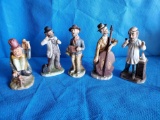 Bisque Porcelain figurine grouping including Lefton playing Cello, and Hobo with monkey on his back