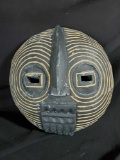 carved wood mask, wall hanging