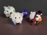 This assortment of cute piggy banks including Christmas Frosty the Snowman pig bank