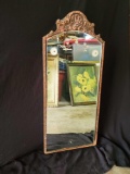 Antique beveled, etched mirror in scallop carved wood frame