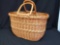 Woven basket with handles