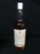 Sealed white label Dewar's Scotch whiskey bottle with contents