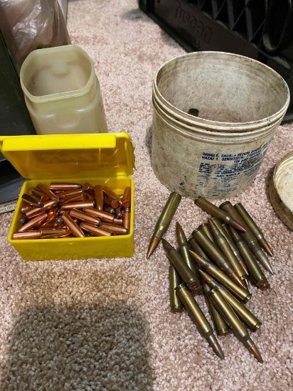 Military ammo box with assortment of 303 heads and more cartridges