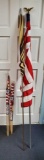 American flags and tall umbrella stand