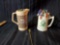 Vintage 100 Pipers Scotch ceramic pitcher with stirrers