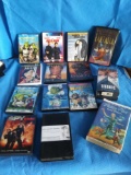 Group of DVD movies and VHS, including STILL SEALED VHS Peter Pan starring Mary Martin and Titanic