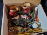 Box of vintage collectibles including Coca-Cola Miller, golf, metal car, cowboy boots