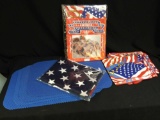 Star-Spangled grouping including oval tablecloths, napkins, rubber placemats and new flag in package