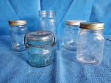 Grouping of vintage canning jars including Ball and blue Atlas