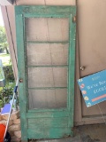 Vintage wooden door with 4 glass panels.