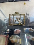 Sterling silver brooch of Puppy looking into 3 pane window