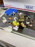 Wonderful lot of tiny ceramic and plastic animals including Wade and Wilton