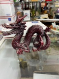 Heavy red carved lacquer resin dragon sculpture