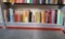 Book shelf grouping including Popular Mechanics 4 volume set, Birding, cookbooks