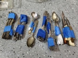 Vintage flatware grouping including knives, teaspoons, unsearched