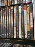 Large lot of hit DVDs in cases