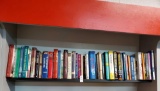 Book shelf grouping including Mitchner, mysteries, fiction, business, Christian and more