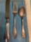 Sterling silver spoon and matching Sterling silver fork and knife.