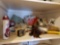 linen closet shelf grouping including light bulbs, weather strip in packs, TIMEX clock, heat pads,
