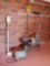 Garage grouping including electric heater, OTT light, yard tools