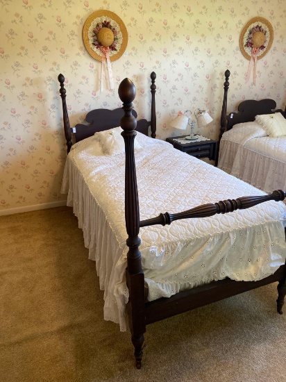 4 post Antique twin bed complete with headboard, footboard, rails and bedding on castors