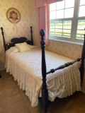 4 post Antique twin bed complete with headboard, footboard, rails and bedding on castors