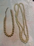 2 Pearl necklaces including long strand and vintage strand with missing clasp