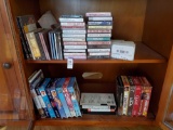 Media grouping including Vintage VHS cartoons, Westerns, DVDs, CDs, and Cassettes