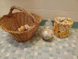 Bathroom grouping including vintage rollers, shells, basket