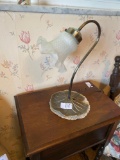 Modern metal desk lamp with floral glass shade