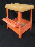 vintage orange metal Hirsch step stool, padded top